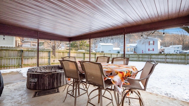 sunroom / solarium with lofted ceiling