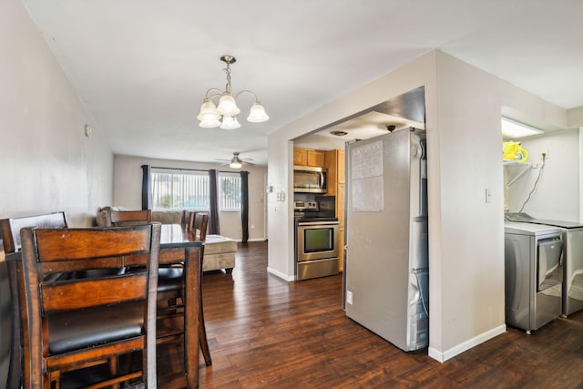 dining area featuring ceiling fan with notable chandelier, washer / clothes dryer, and dark hardwood / wood-style floors