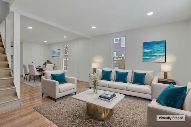 living room with light hardwood / wood-style floors