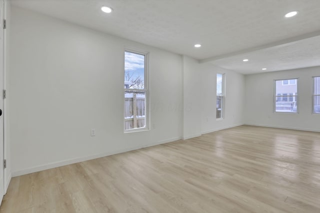 empty room featuring light hardwood / wood-style floors