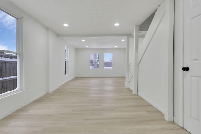 hall with light hardwood / wood-style flooring