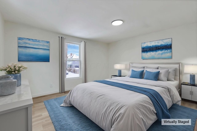 bedroom featuring light hardwood / wood-style flooring