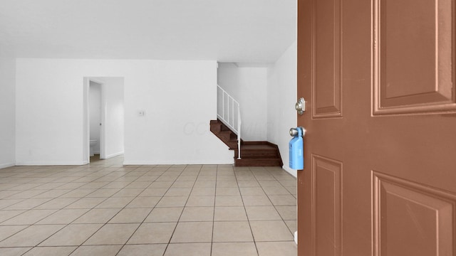 foyer with light tile patterned flooring