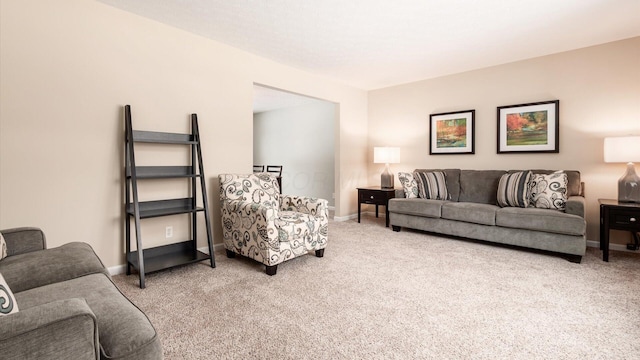 living room featuring light carpet