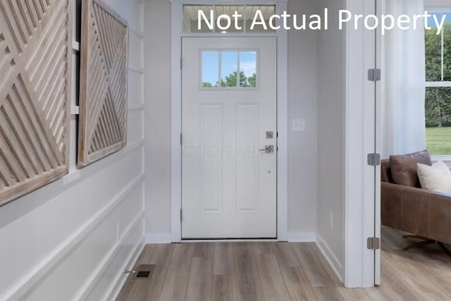 foyer entrance featuring light hardwood / wood-style floors