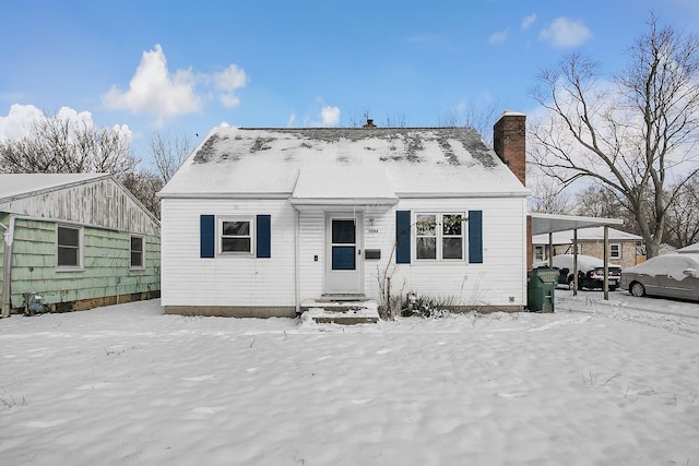 view of front of home featuring a carport