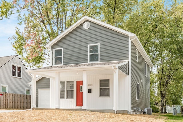 view of front property featuring covered porch and central air condition unit