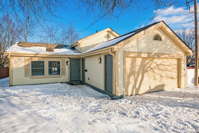 view of front of home with a garage