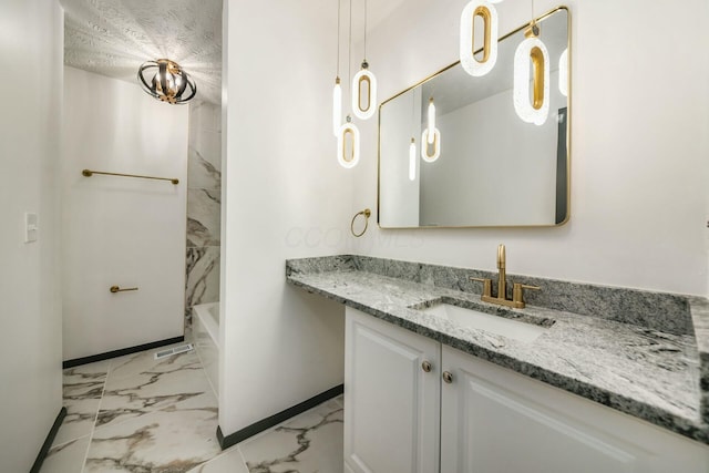 bathroom with vanity, shower / tub combination, and a textured ceiling