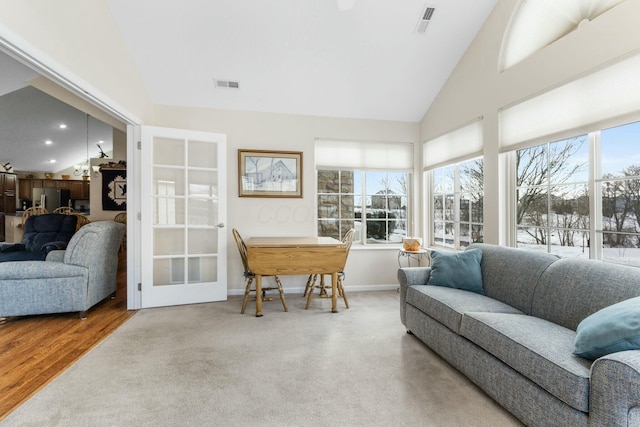 sunroom / solarium with vaulted ceiling