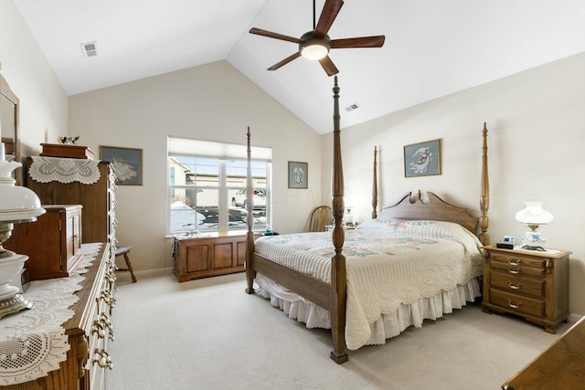 carpeted bedroom featuring lofted ceiling and ceiling fan