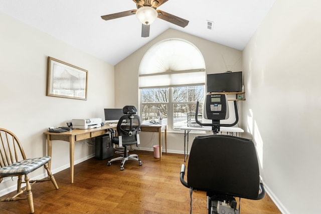 office space with vaulted ceiling, ceiling fan, and hardwood / wood-style floors