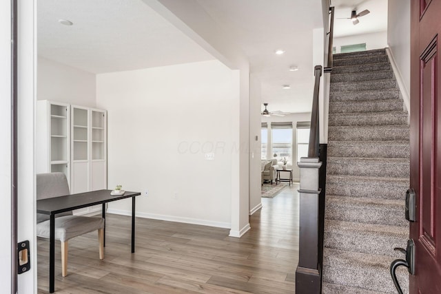 office space with ceiling fan and hardwood / wood-style flooring