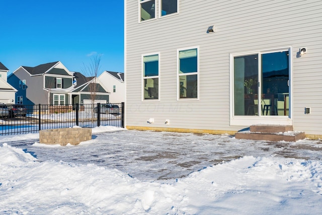 view of snow covered house