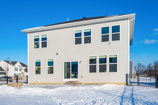 view of snow covered property