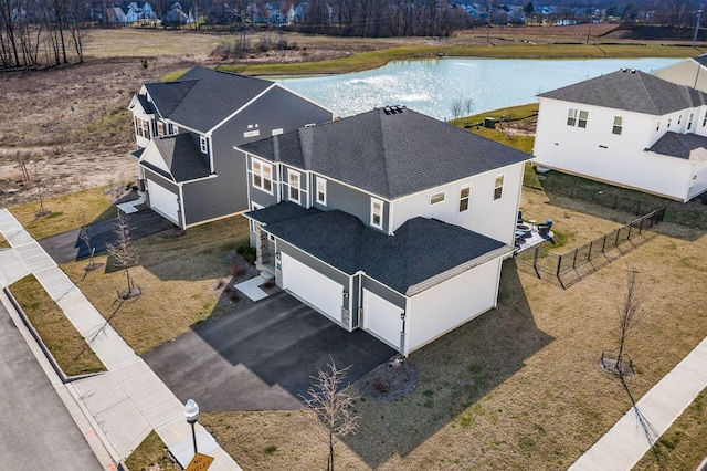 bird's eye view with a water view