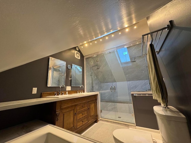 bathroom featuring a textured ceiling, vanity, toilet, and an enclosed shower