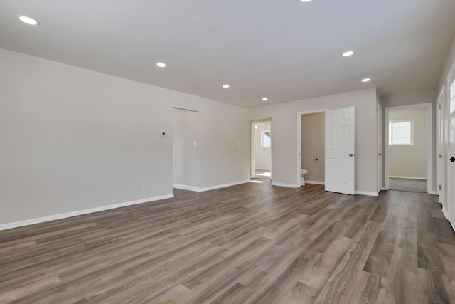 unfurnished room featuring dark hardwood / wood-style floors