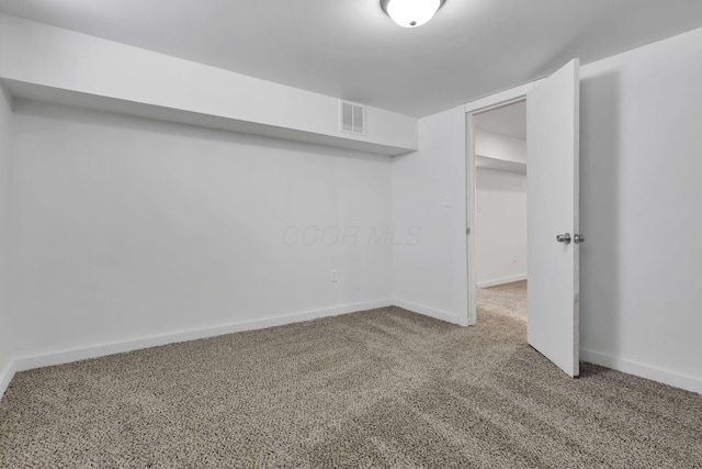 basement featuring carpet flooring