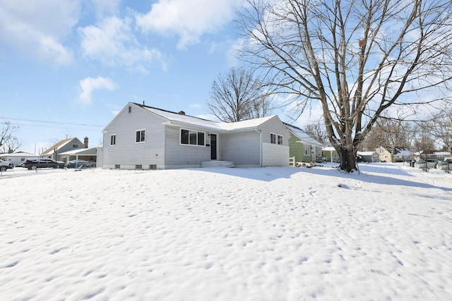 view of snow covered property