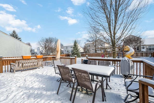 view of snow covered deck