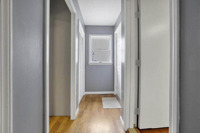 hall with light wood-type flooring