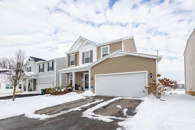 view of front of property featuring a garage