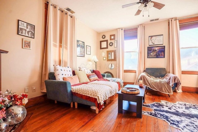 bedroom with hardwood / wood-style flooring and ceiling fan