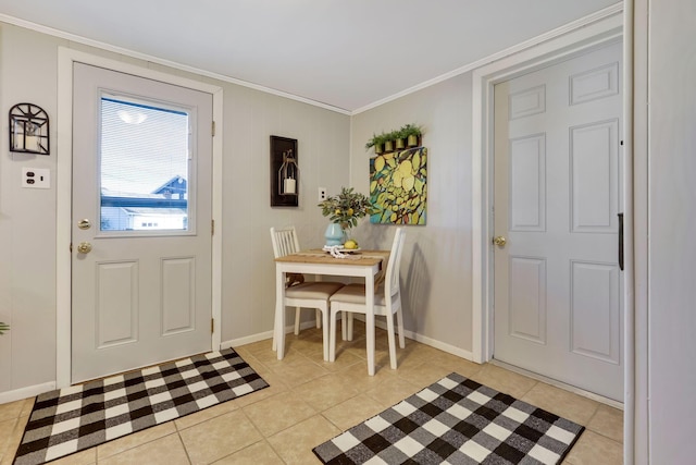 entrance foyer with light tile patterned flooring and ornamental molding