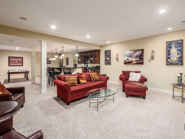 living room featuring ornate columns, light carpet, bar, and billiards