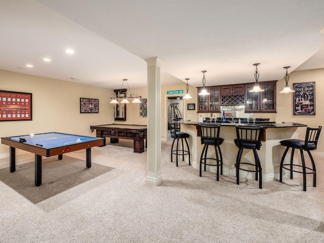 playroom featuring ornate columns, indoor bar, light colored carpet, and pool table