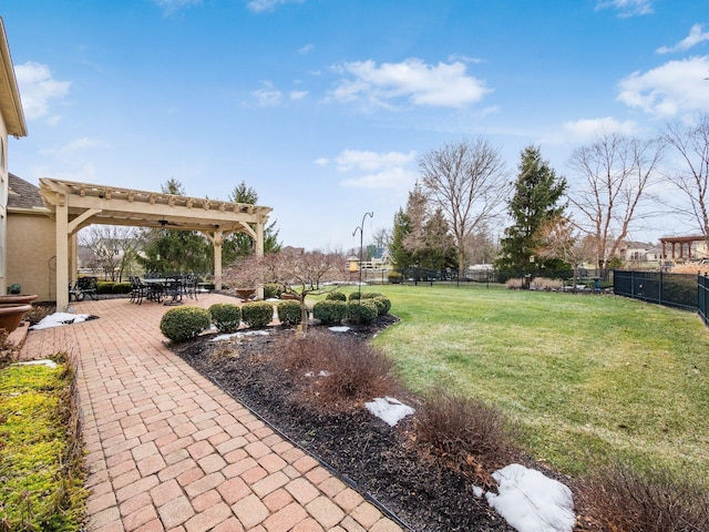 view of yard with a pergola and a patio