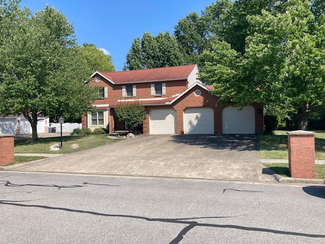 view of front of property with a garage