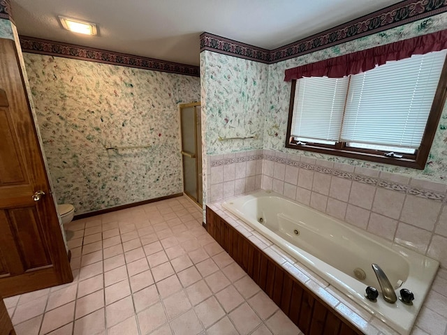 bathroom featuring tile patterned floors, independent shower and bath, and toilet