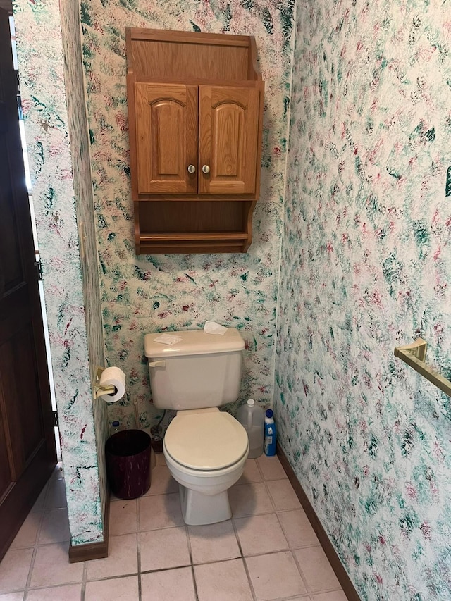 bathroom featuring tile patterned floors and toilet