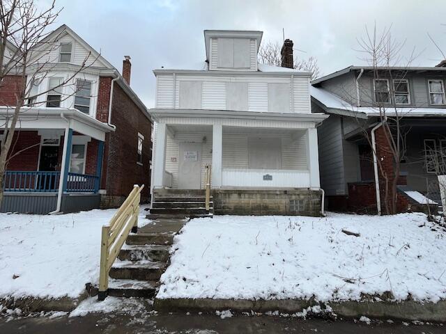 view of front of home featuring covered porch