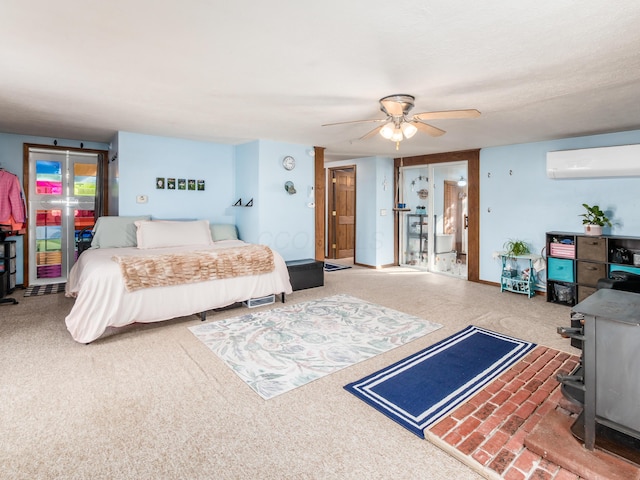 bedroom with ceiling fan and a wall unit AC