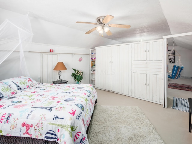 bedroom with vaulted ceiling and ceiling fan