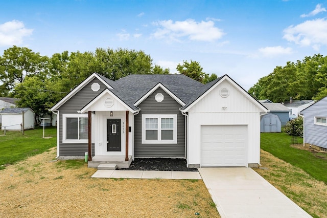 view of front of home with a front yard and a storage unit