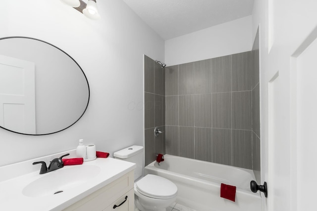 full bathroom with vanity, toilet, and tiled shower / bath combo