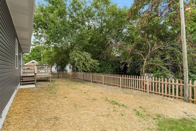 view of yard with a deck