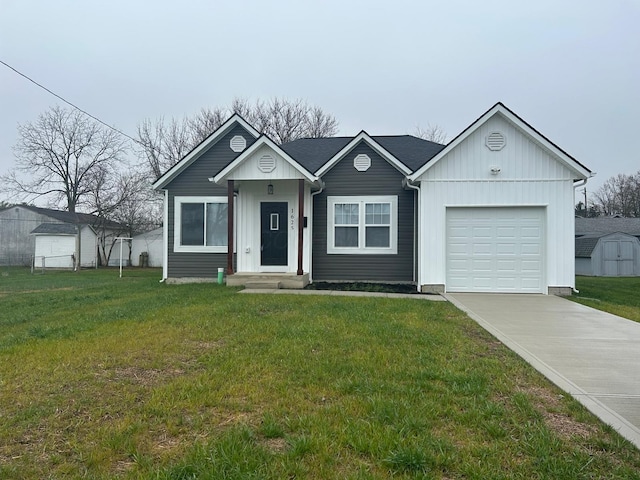 ranch-style home with a garage and a front yard