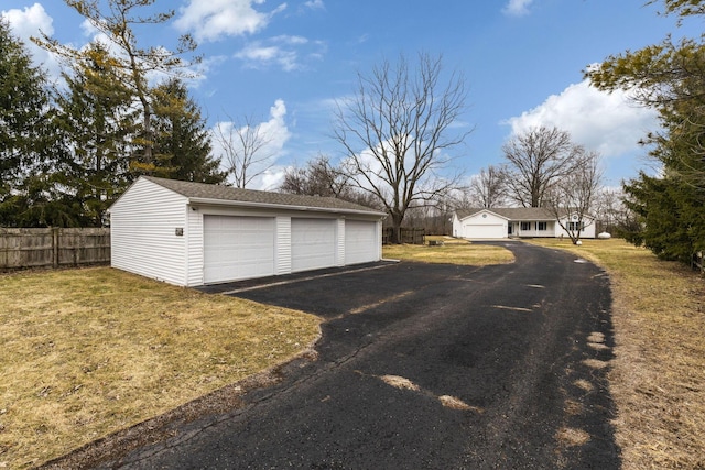 garage with a yard