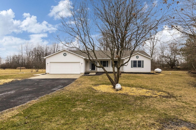 single story home with a garage and a front yard