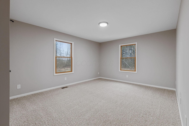 view of carpeted spare room