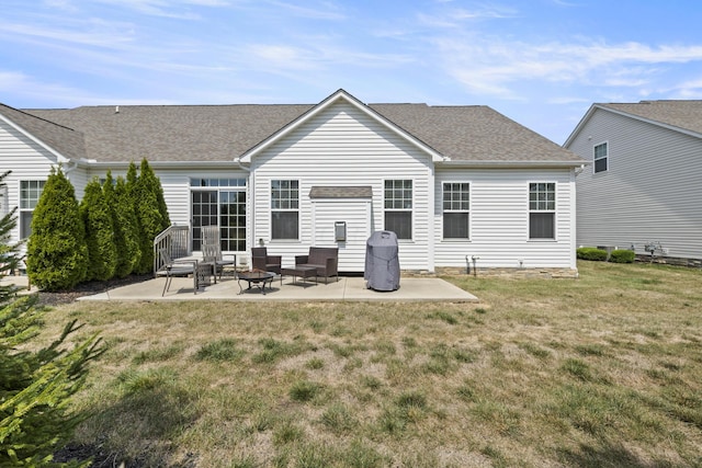 back of property with a lawn, an outdoor living space, and a patio