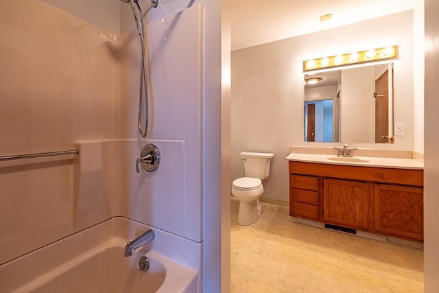 full bathroom featuring toilet, vanity, and washtub / shower combination