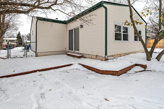 view of snow covered property