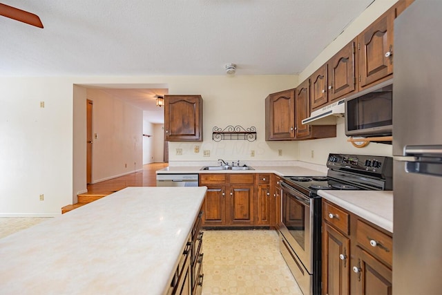 kitchen with appliances with stainless steel finishes and sink