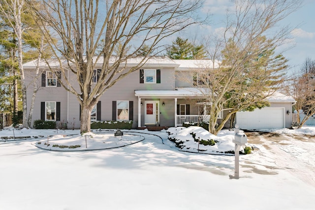 view of front of property with a garage and a porch